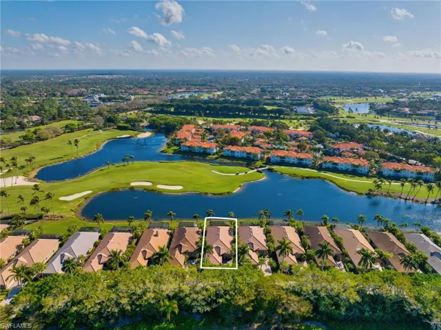 This residence location in Grey Oaks, with lake and golf course views of the 8th on the Palm Course.