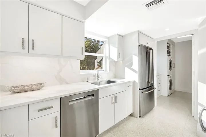 Must see this kitchen with views of the pool