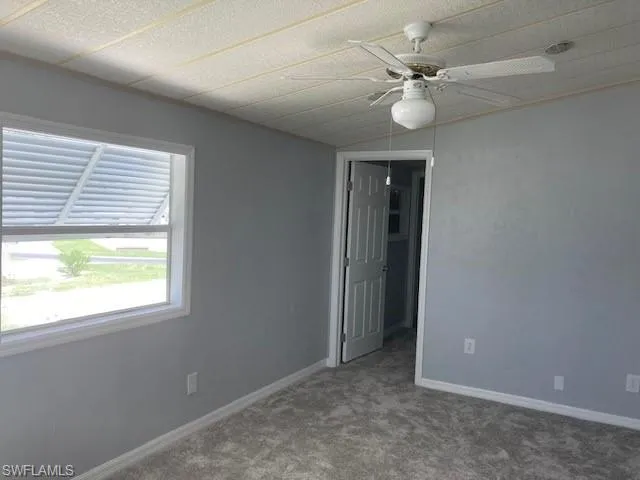 living room looking into second bedroom