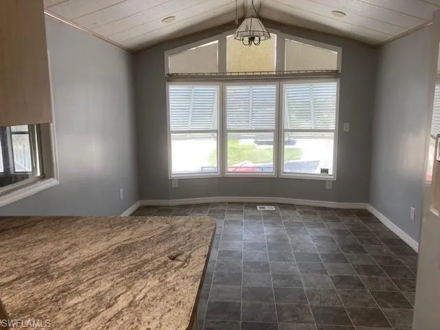 vaulted ceiling, healthy amount of natural light
