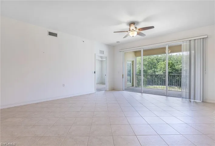 Totally Open Floor Plan for you to make Your Very Own! Note the 3 Panel Stacking Sliding Doors that are Storm Impact Resistant!