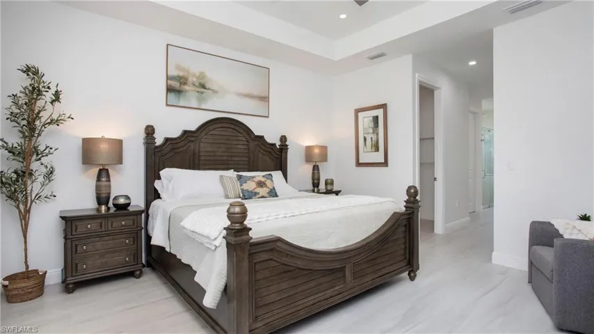 Bedroom with recessed lighting and light wood-type flooring