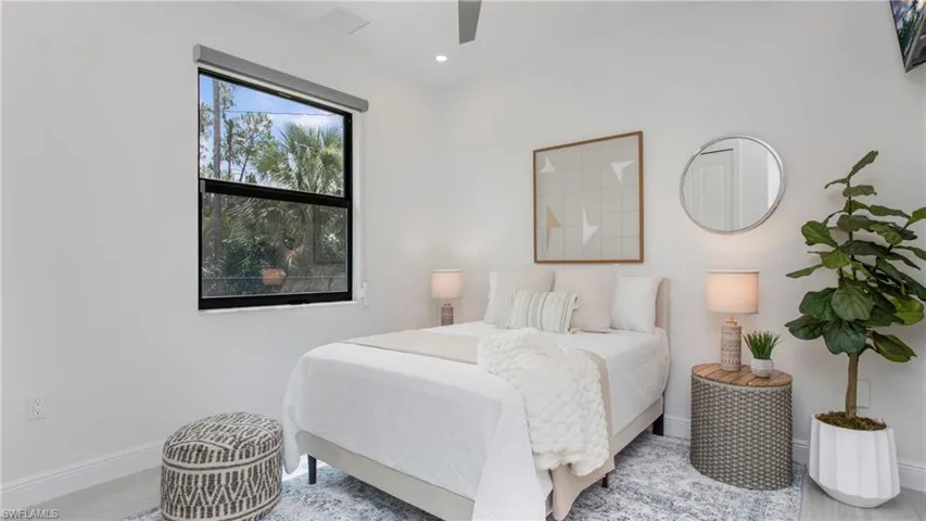 Bedroom featuring recessed lighting and a ceiling fan