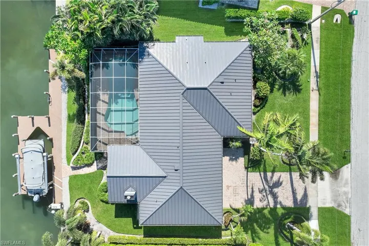 View of subject property with a pool area