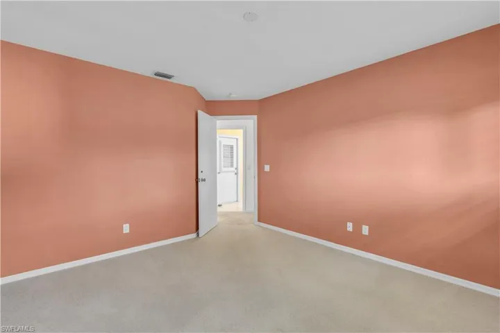 Spare room with light carpet
