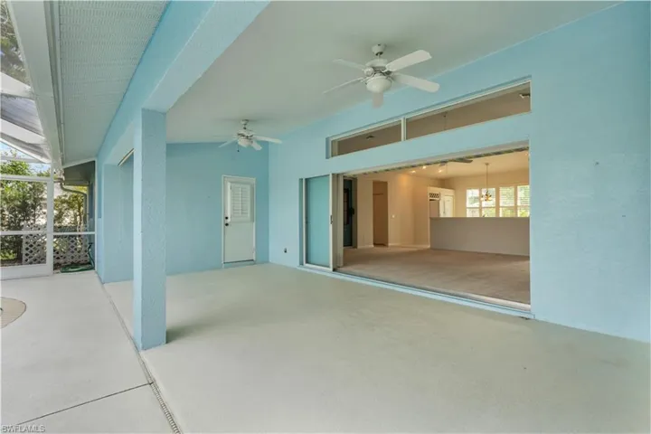 View of patio featuring ceiling fan