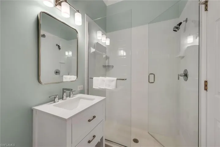 Second bathroom is located in hall convenient to second bedroom and for visiting friends and/or family