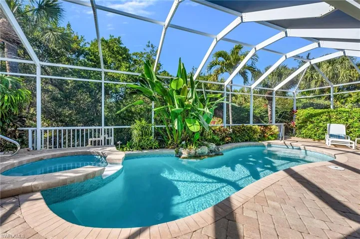Warm days this pool will be so well received!  Pavered decking surrounds the pool and preserve backdrop offers privacy and western skies for sunset vistas