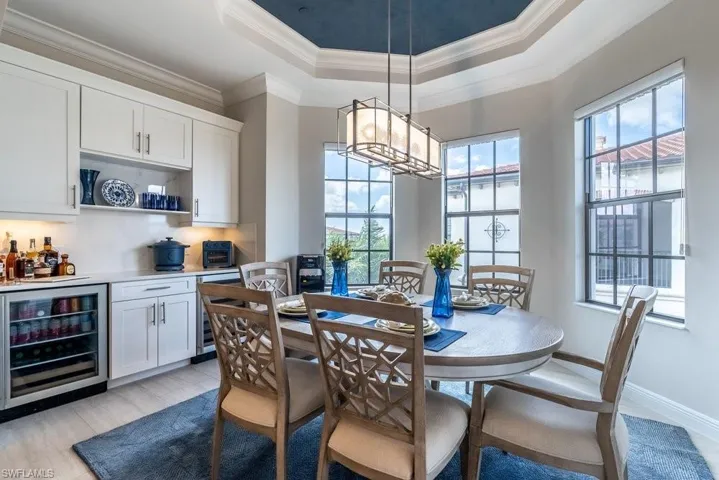 Formal dining area dry bar with wine & beverage cooler