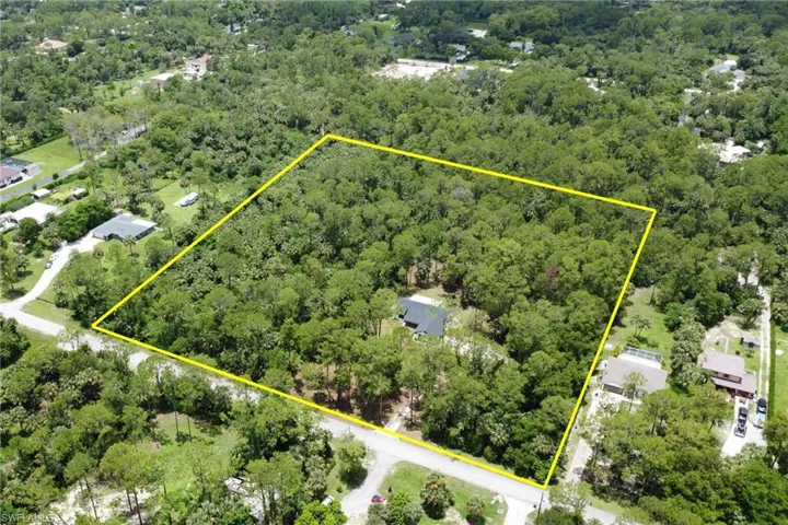 Aerial overview of property's location with property parcel outlined