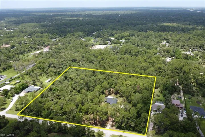 Aerial view of property's location featuring property parcel outlined