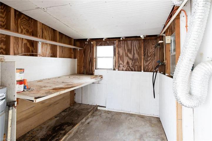 Laundry room-in carport w/ex- storage