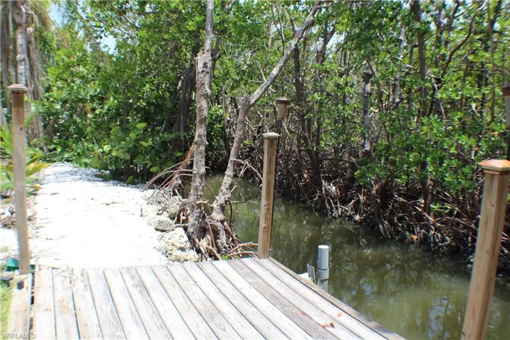 wooden dock on tidal canal