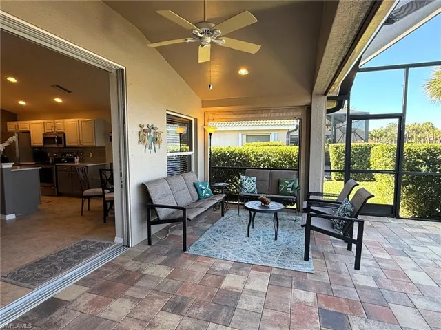Under cover patio with privacy shades and Hurricane shades