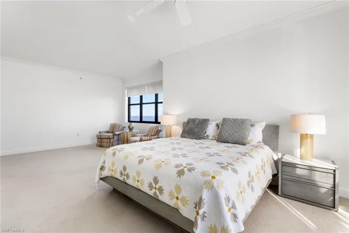 Your primary bedroom has fabulous views of the lake and river!