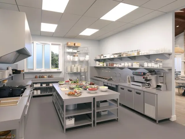 New Kitchen with open shelves, light countertops, and state of the art equipment to enhance our new restaurant opening soon
