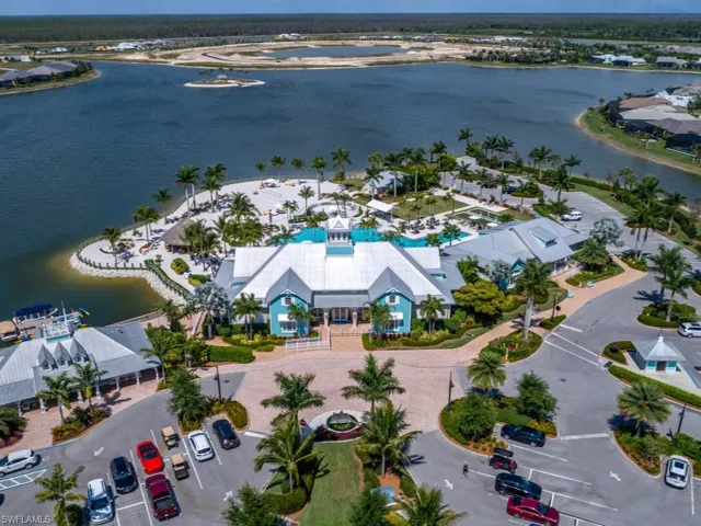 Aerial view of the clubhouse with pool on the lake