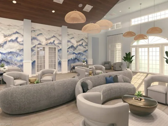 Community lobby with a high wood ceiling and recessed lighting with entrance to pool area