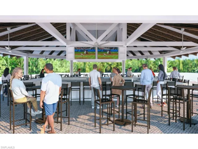 View of new sports bar with tvs and high top tables for your enjoyment
