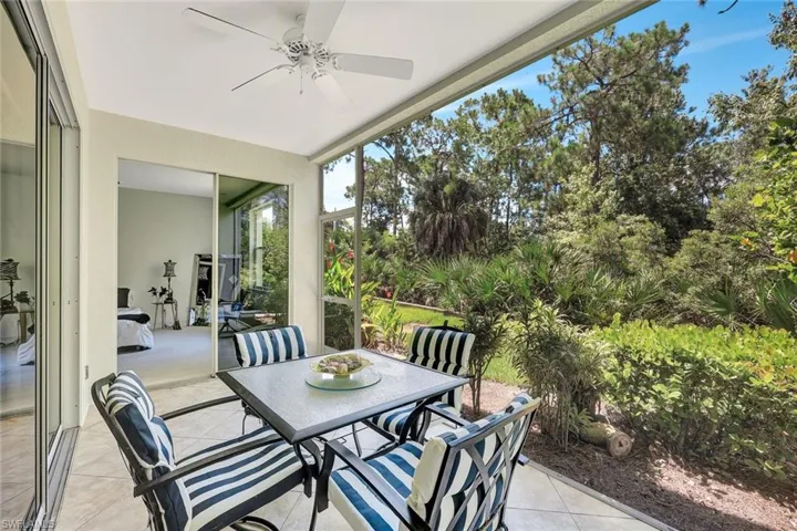 View of patio featuring a ceiling fan and outdoor dining area
