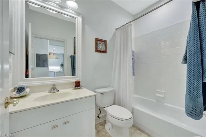 Full bathroom with vanity and shower / tub combo