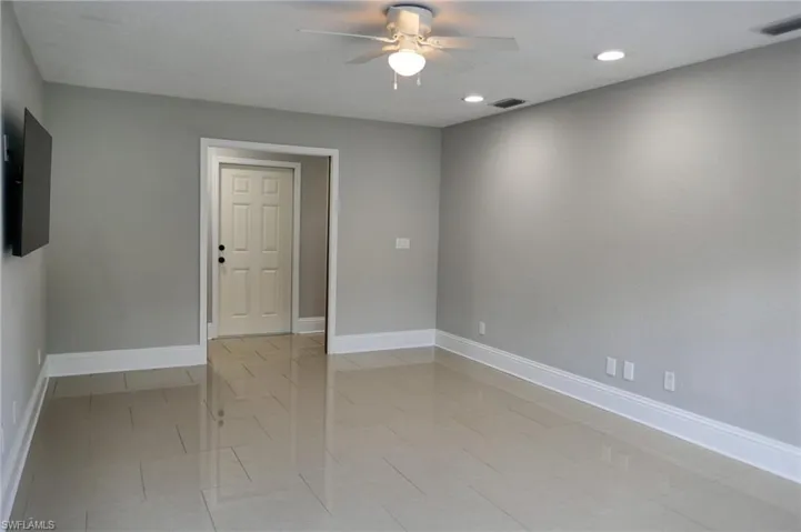 Entry for bonus room with double sliding doors