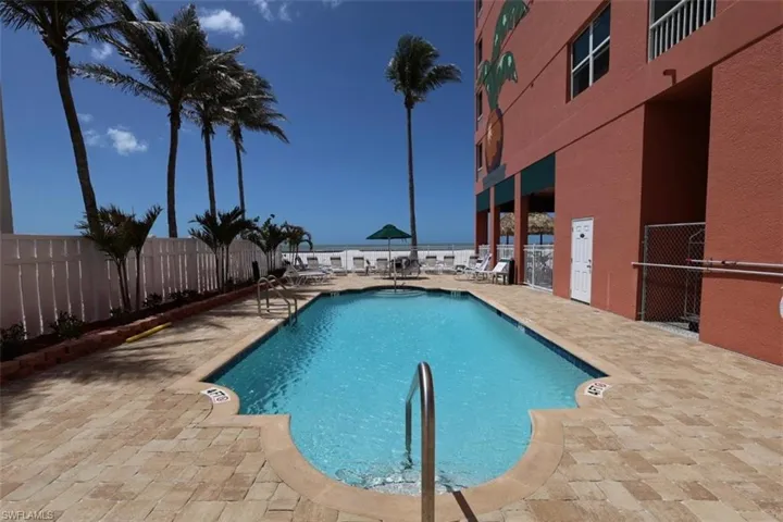 Community pool with lounging deck.