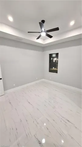 Unfurnished room with ceiling fan
