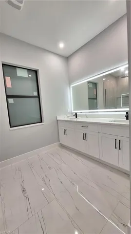 Bathroom featuring vanity