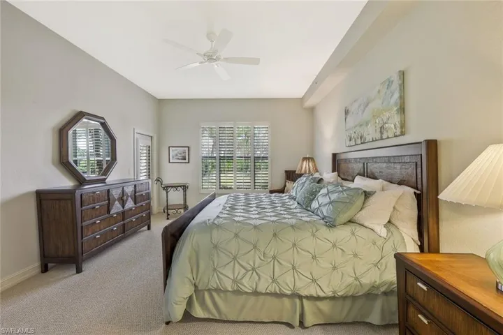Primary suite features lakes views and lanai access.