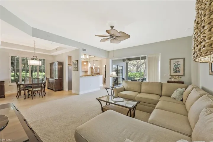 Open great room with abundant natural light and lake views.