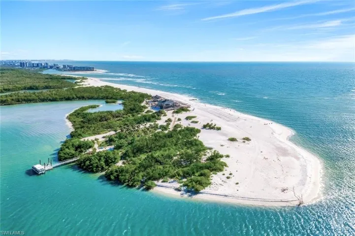 Pelican Landing features a private beach only accessible by boat shuttle.