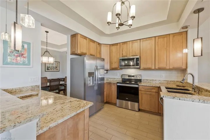 Kitchen has been tastefully updated with TONS of cabinet space.