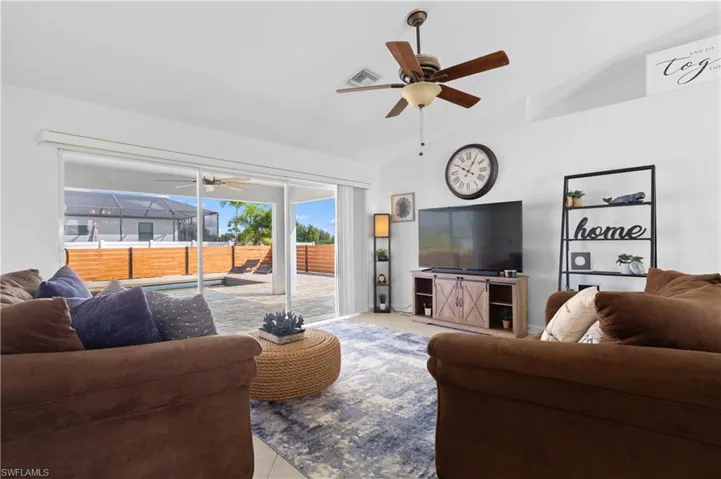 Living area overlooks pool