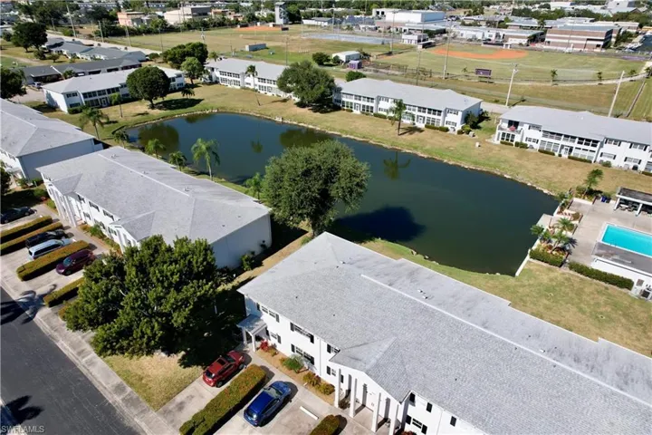 Aerial view of residential area with a large body of water