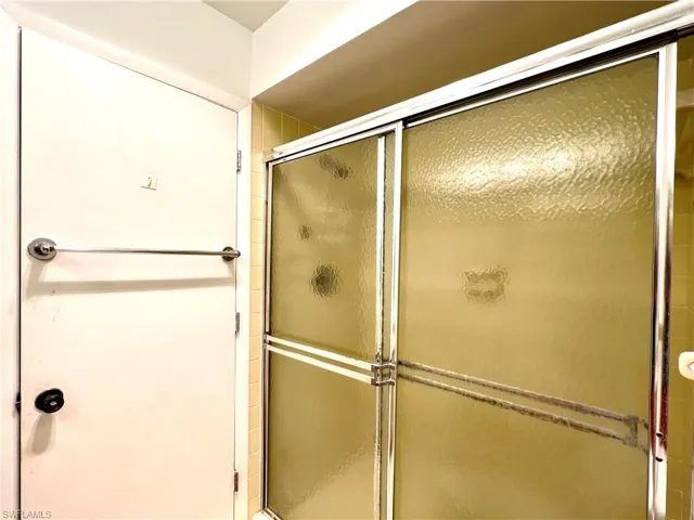 Full bath with a stall shower