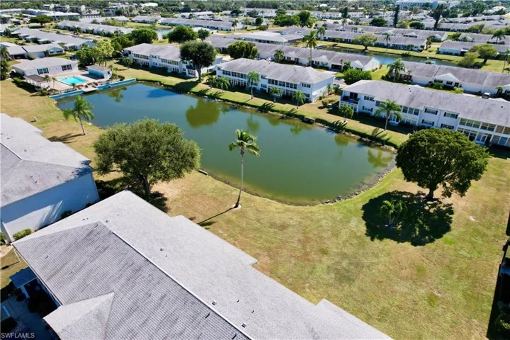 Aerial view of residential area with a nearby body of water