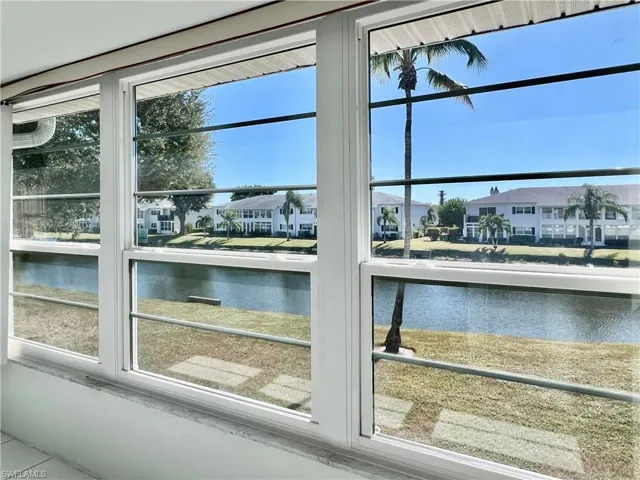Water view with nearby suburban area
