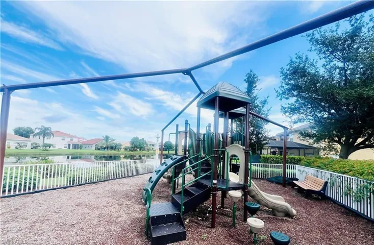 Communal playground featuring a residential view