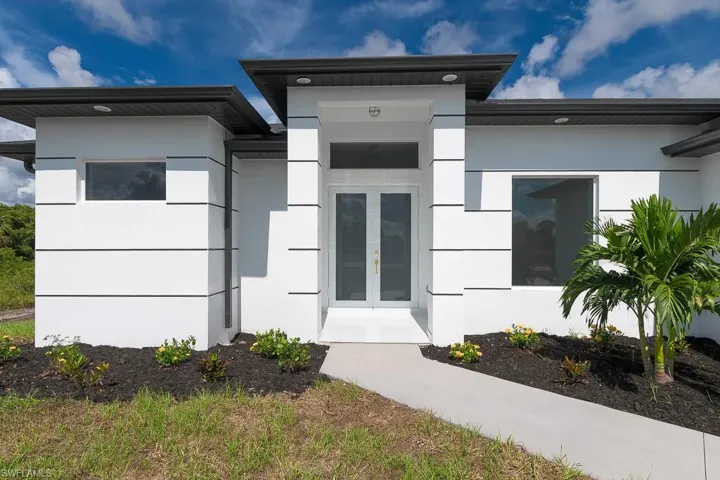 View of front of house featuring french doors