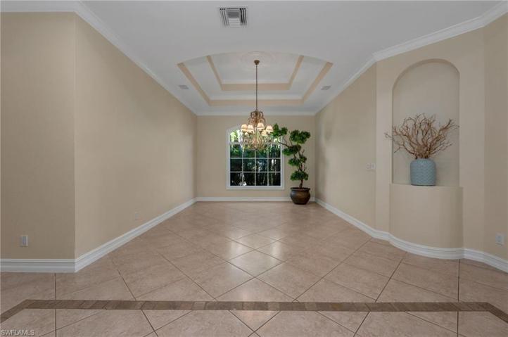 This formal dining room could be repurposed into a den by adding walls and glass French doors. Oh, the possibilities...