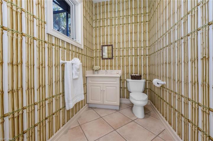 Cabana Bath by the pool...which could be transformed into an outdoor kitchen with larger window to the lake.  Endless possibilities in this residence!