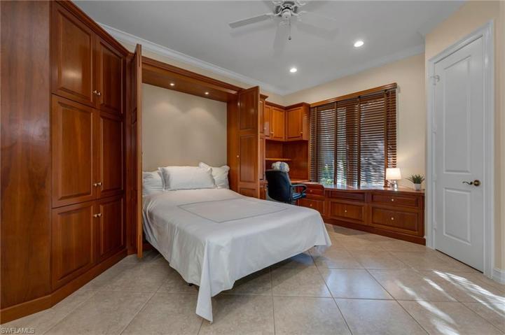 This ensuite office/bedroom is spacious with large closet, and the guest bed easily is enclosed into the cabinetry.