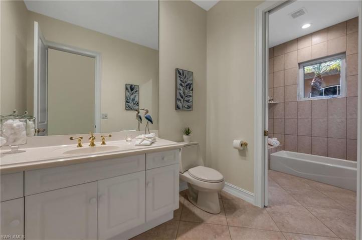 The guest bath, which serves as a Jack and Jill for the front guest bedrooms and the office bedroom.