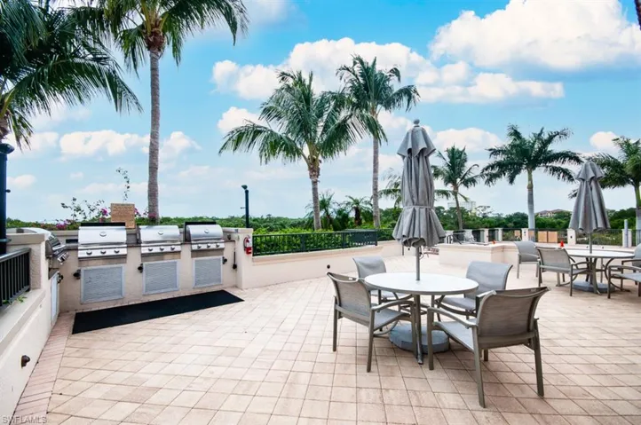 View of patio featuring an outdoor kitchen / dining area