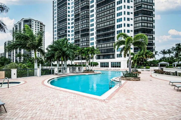 Community pool featuring a patio area