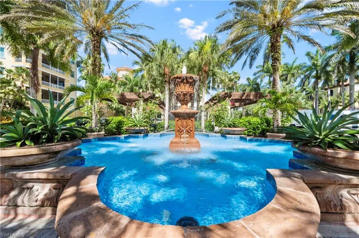 Outdoor pool featuring a patio