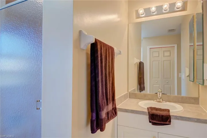 Bathroom with visible vents and vanity