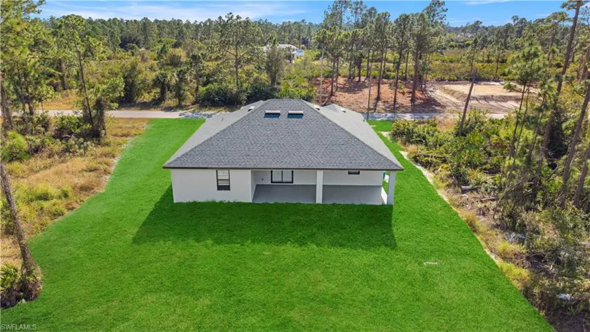 Aerial view of property and surrounding area
