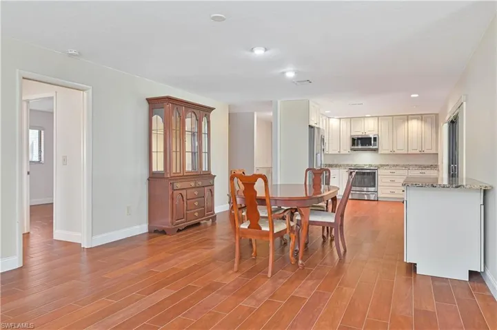 Dining room with Tile finished floors and recessed lighting